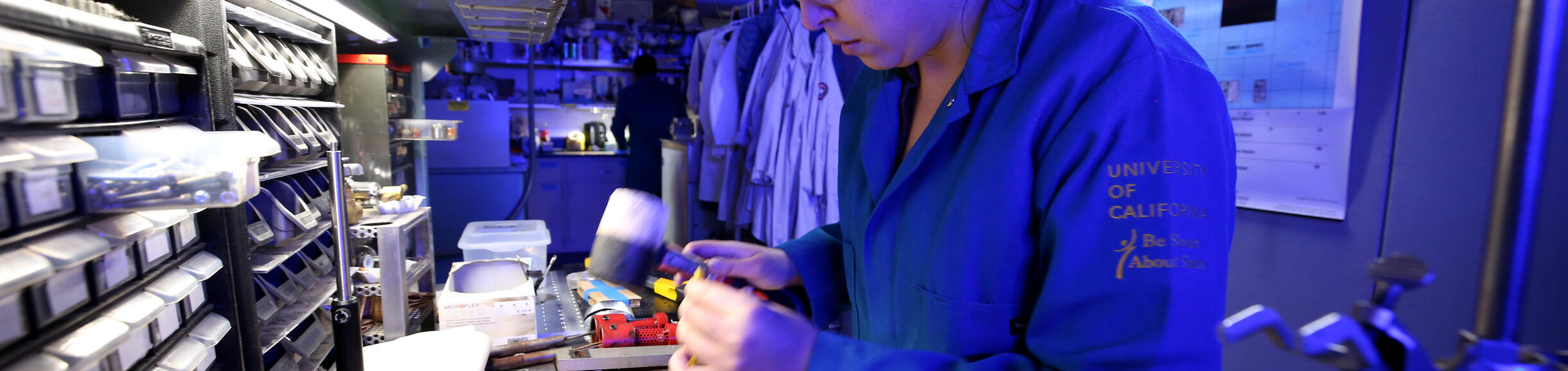 Student in Lab working on computer board