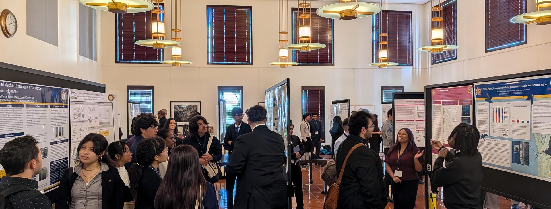 A crowd of students participating in poster presentations at CAMP Statewide 2026